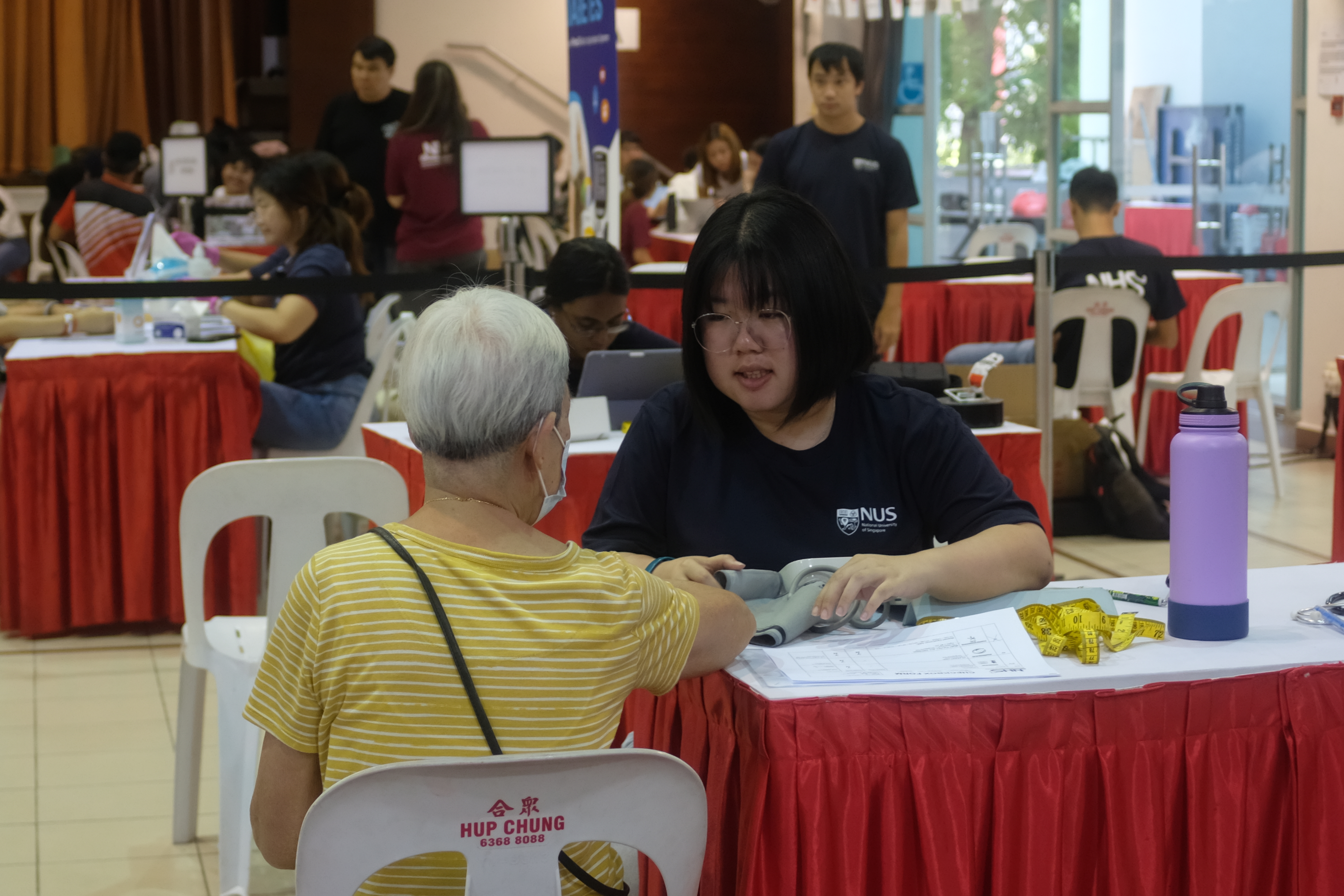NHS volunteer with elderly resident